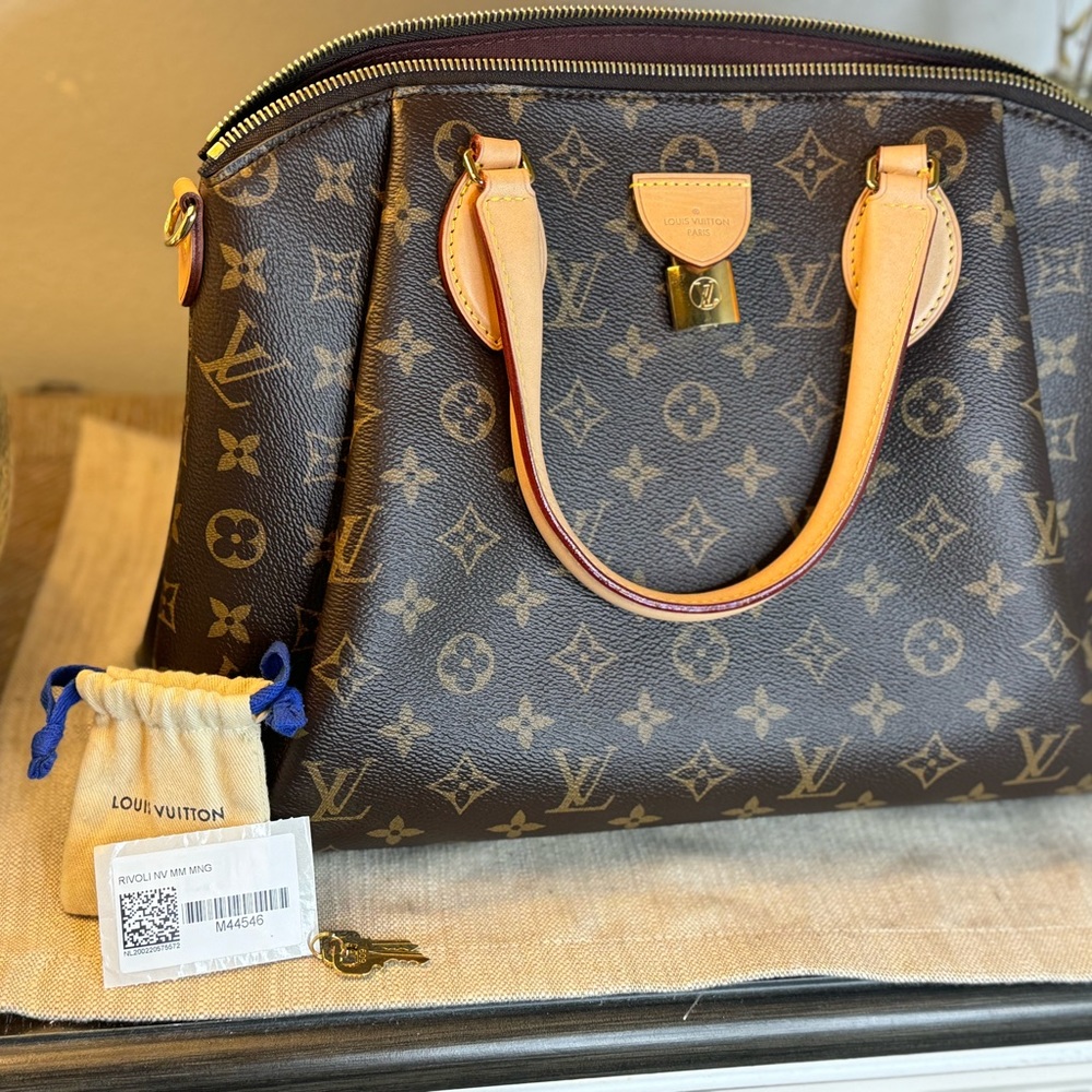 - Louis Vuitton Rivoli MM new